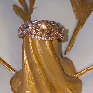 Amber gemstone with white accents gems & flowers.